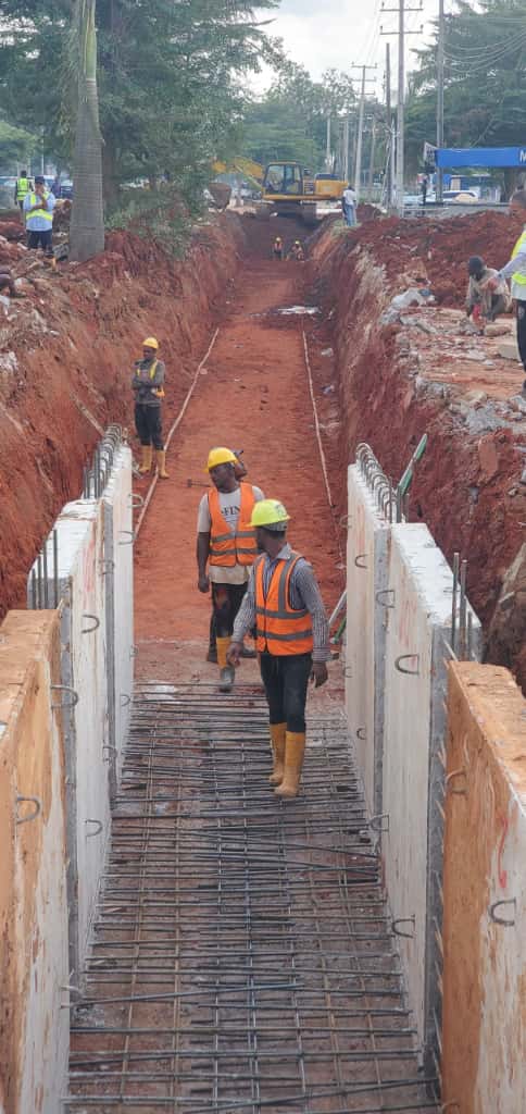 Excavation of 1.5m x 1.7m ( varies) open channel drain at the left hand side by Summit road, Asaba. At CH 0+220.