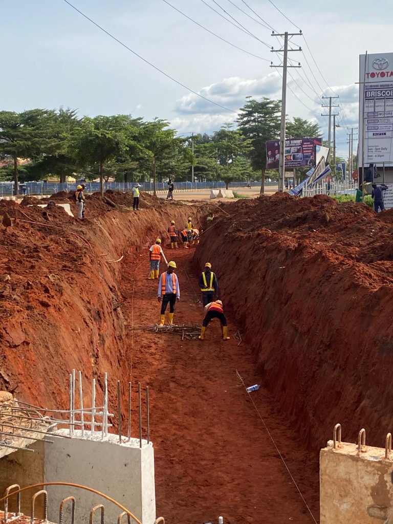 Excavation preparation for the 1.5 x 1.625m U-channel drain by submit road