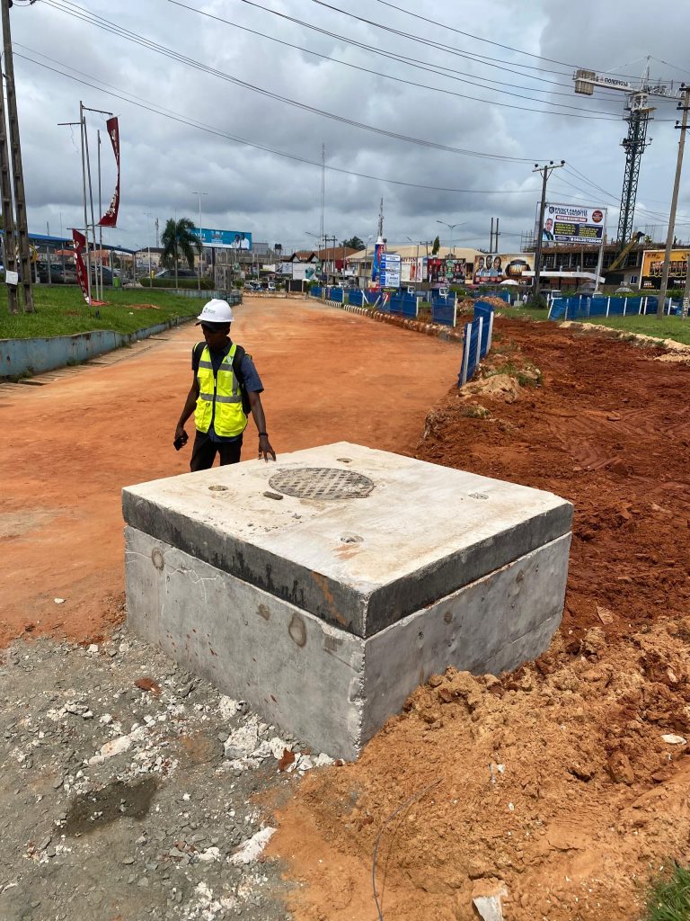 Manhole final cover placed front by ShopRite